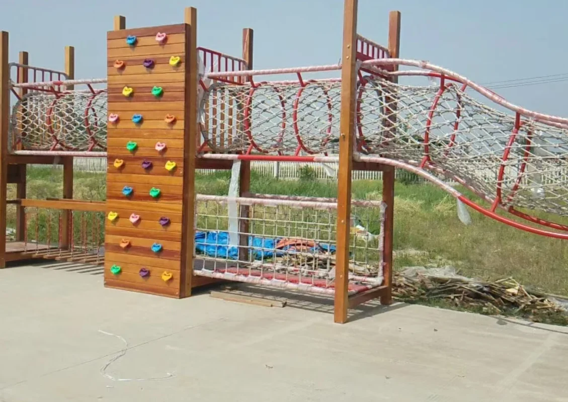 Custom Playground Design & Manufacturing | Factory-Direct OEM/ODM Support | Xinjiu Close-up of a playground play panel and spring mechanism