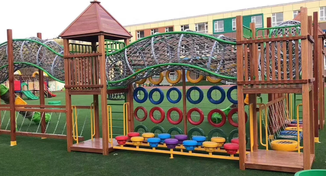 Custom Playground Design & Manufacturing | Factory-Direct OEM/ODM Support | Xinjiu Wooden playground structure with climbing ropes