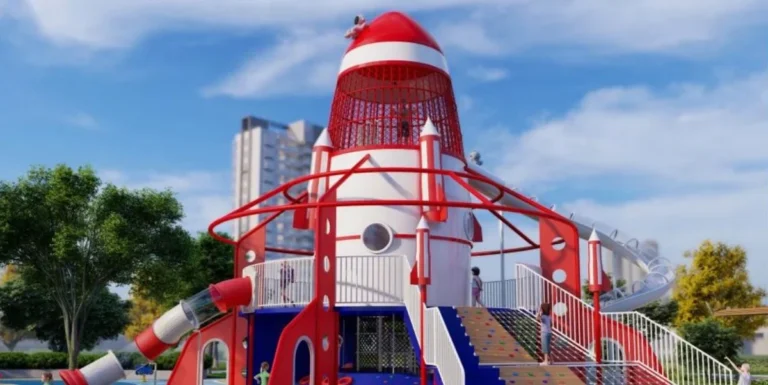 Playground Equipment Manufacturer | Indoor Soft Play & Custom Outdoor Playgrounds | Xinjiu Red rocket-shaped bespoke playground with elevated platforms and slides