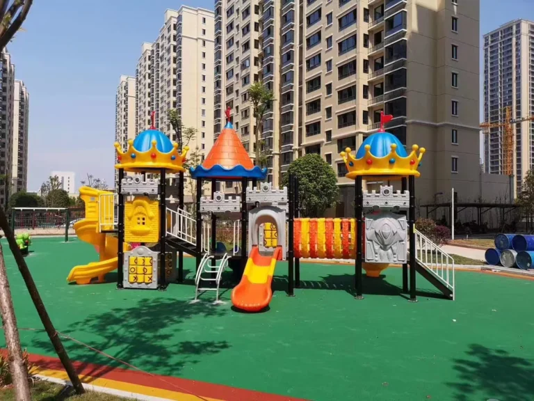 Playground Equipment Manufacturer | Indoor Soft Play & Custom Outdoor Playgrounds | Xinjiu Colorful combination playground set among residential buildings
