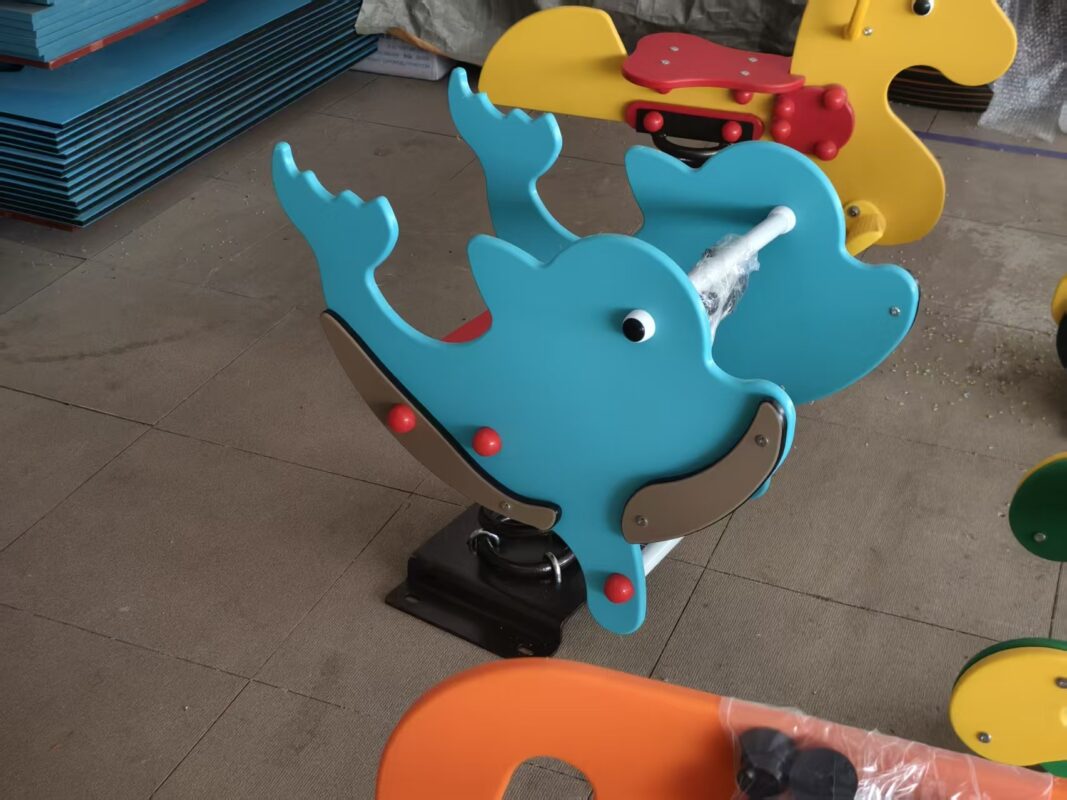 Indoor & Outdoor Playground Equipment | Soft Play, Custom Structures & Slides | Xinjiu Blue dolphin PE panel spring rider