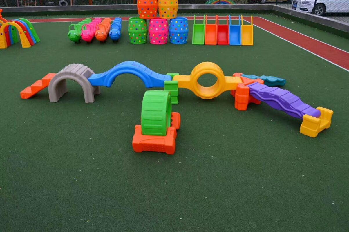 Indoor & Outdoor Playground Equipment | Soft Play, Custom Structures & Slides | Xinjiu Modular colorful balance path pieces